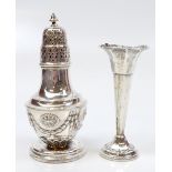 MARTIN, HALL & CO; an Edward VII hallmarked silver sugar caster with repoussé foliate detail on