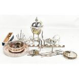 A mixed group of silver plated items including dishes, a toast rack, a bottle coaster.