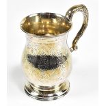 HILLIARD & THOMASON; a Victorian hallmarked silver christening mug with stylised scrolling handle