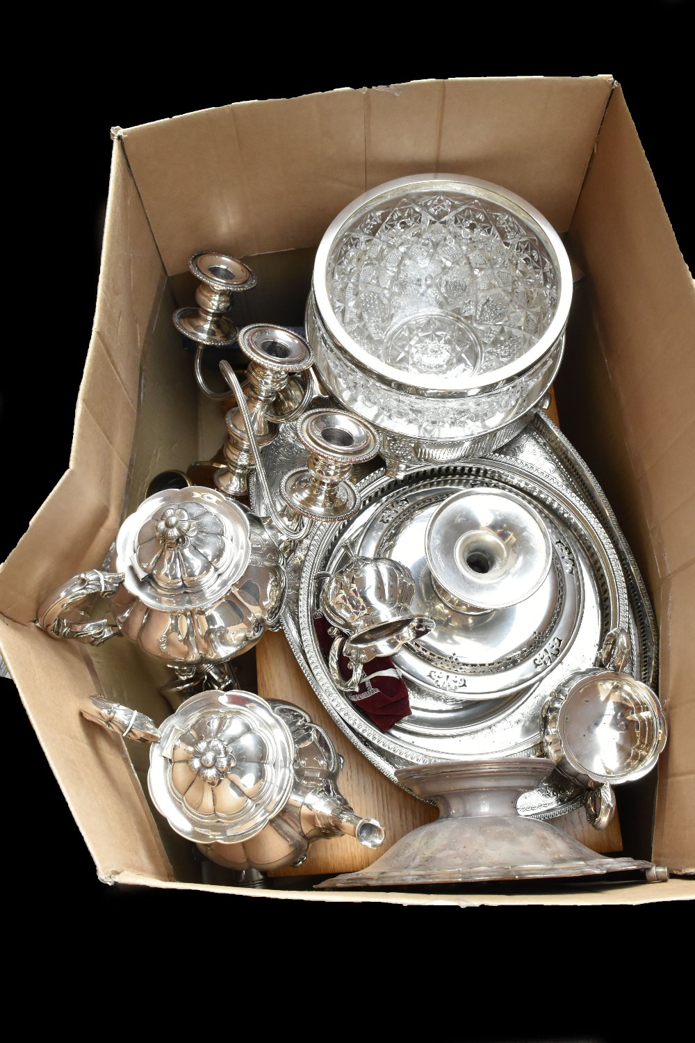 A mixed group of electroplated items including canteen, tea and coffee pots, trays, etc.