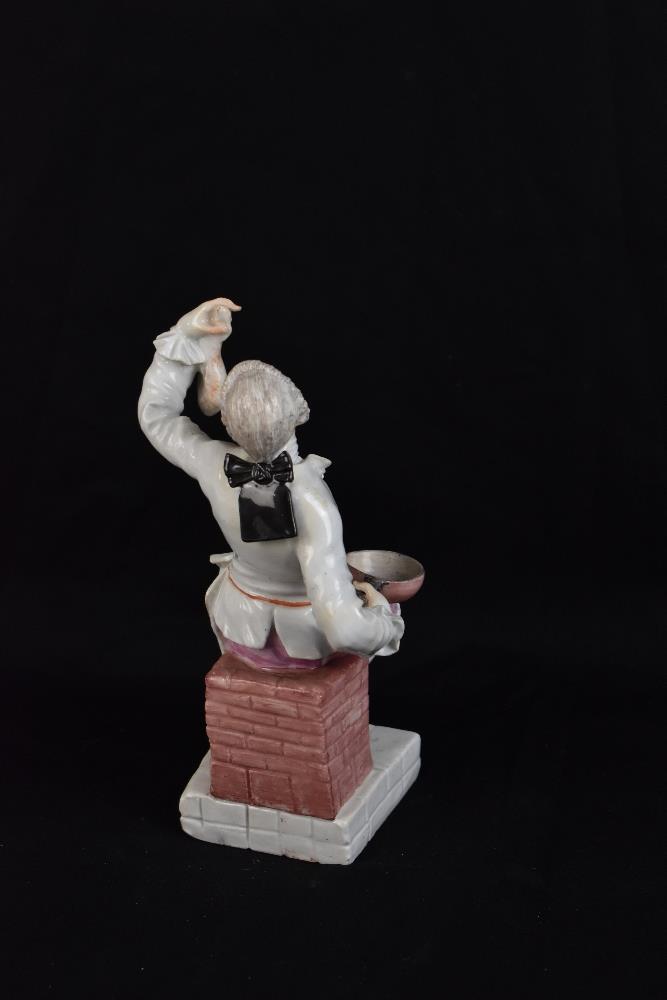 MEISSEN; a mid-18th century figure of a seated cook modelled by JJ Kaendler and Paul Reinicke, circa - Image 4 of 8