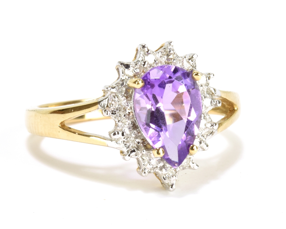 A 9ct yellow gold pear cut amethyst and diamond dress ring, size L, approx 2.5g.