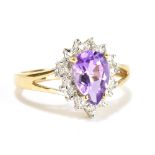 A 9ct yellow gold pear cut amethyst and diamond dress ring, size L, approx 2.5g.