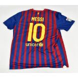 LIONEL MESSI; a signed FC Barcelona Nike home shirt, named and numbered 10 to reverse, size XL.