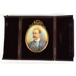 A late 19th/early 20th century watercolour on ivory portrait miniature depicting gentleman with