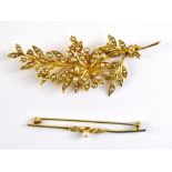 A yellow metal and seed pearl floral brooch, and a yellow metal and seed pearl bar brooch, approx