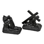 A pair of early 20th century cast spelter religious figures depicting Christ supporting the Cross,