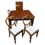 A set of ten Victorian walnut balloon back dining chairs with padded drop in seats and a Victorian