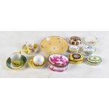 A group of porcelain cups, saucers and trinket boxes with manufacturers including Royal Crown Derby,