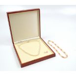 A cultured freshwater pearl necklace with yellow metal clasp stamped 9k, length 40cm, with