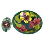 WALTER MOORCROFT; an 'Orchid' pattern ashtray of oval form, length 15.5cm (af), together with a