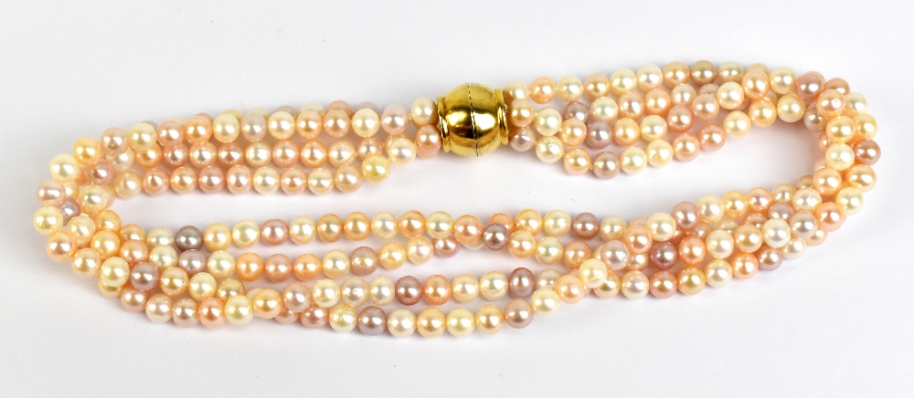 LANGER; a four strand fresh water pink pearl necklace with magnetic Langer clasp.Additional