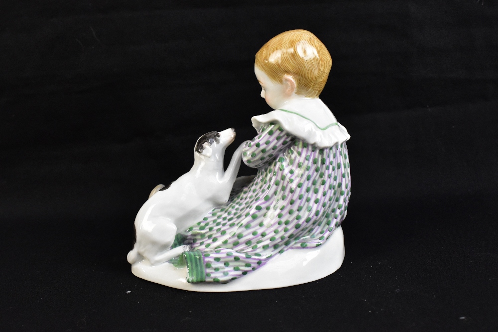 MEISSEN; a 20th century figure group of a young child seated with a puppy at their feet, painted - Image 3 of 6