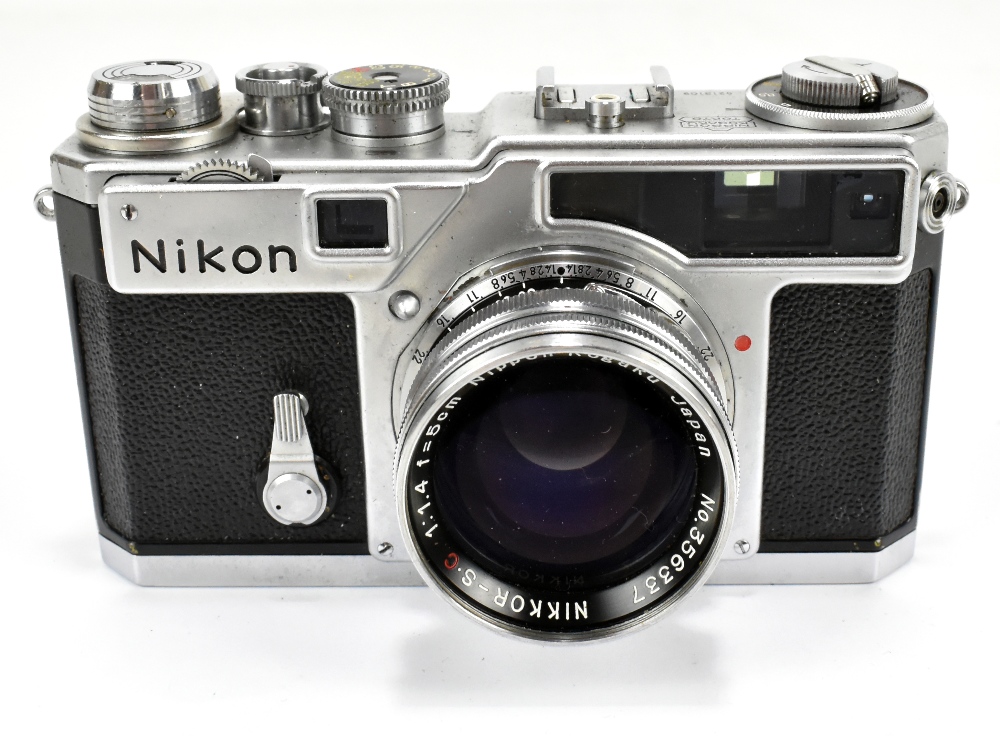 NIKON; an SP camera with Nikkor-S.C 1:1.4 F=5cm lens, no.356337, the body no.6213109, cased.