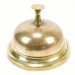 A large brass table top bell.Additional InformationRings, there are dents, misshaping, pitting,