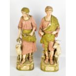 ROYAL DUX; a large pair of figures modelled as a young gentleman beside a goat and young woman