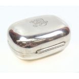 STOKES & IRELAND LTD; a Edward VII hallmarked silver oval box of plain form with engraved initials