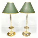 IN THE MANNER OF STUART CRYSTAL; a pair of table lamps with green shades, height 50cm (2).