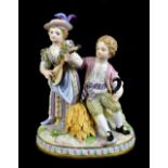 MEISSEN; a mid-19th century figure group of a young boy and girl emblematic of summer, painted