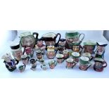 A collection of twenty-seven various character and Toby jugs including large Royal Doulton D5420