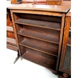 A 20th century oak floor standing bookcase of four shelves on block feet, height 116cm, width 89cm.