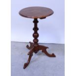 A reproduction stained wood occasional table on tripod cabriole base, height 72cm.