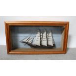 A scratch-built three-masted ship diorama with sails, in glazed display case, case 51 x 95cm.