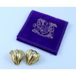 A pair of 9ct gold clip-on earrings of curved leaf design, combined approx 10.3g.