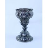 A late 19th century Continental silver plate altar ciborium chalice profusely decorated with