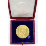 An Edward VII 1902 Gold Coronation Medal, Princess Alexandra to reverse,