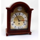 A modern walnut-cased mantel clock dial signed 'Rapport', triple train movement, Westminster chime,