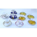 A collection of various cabinet cups and saucers including two Dresden cup & saucers painted with