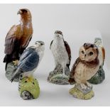 Four Royal Doulton Whyte & Mackay Scotch whisky decanters in the form of birds of prey,