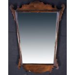 A Georgian mahogany Chippendale-style mirror with carved fretwork frame, height 80cm.
