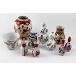 A quantity of miniature Japanese ceramics to include a baluster vase and a larger late 19th/early