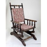 A late 19th century children's bobbin-turned American-style rocking chair, height 68cm.