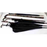 A collection of mainly 19th century parasols and walking canes including gold and silver tipped,