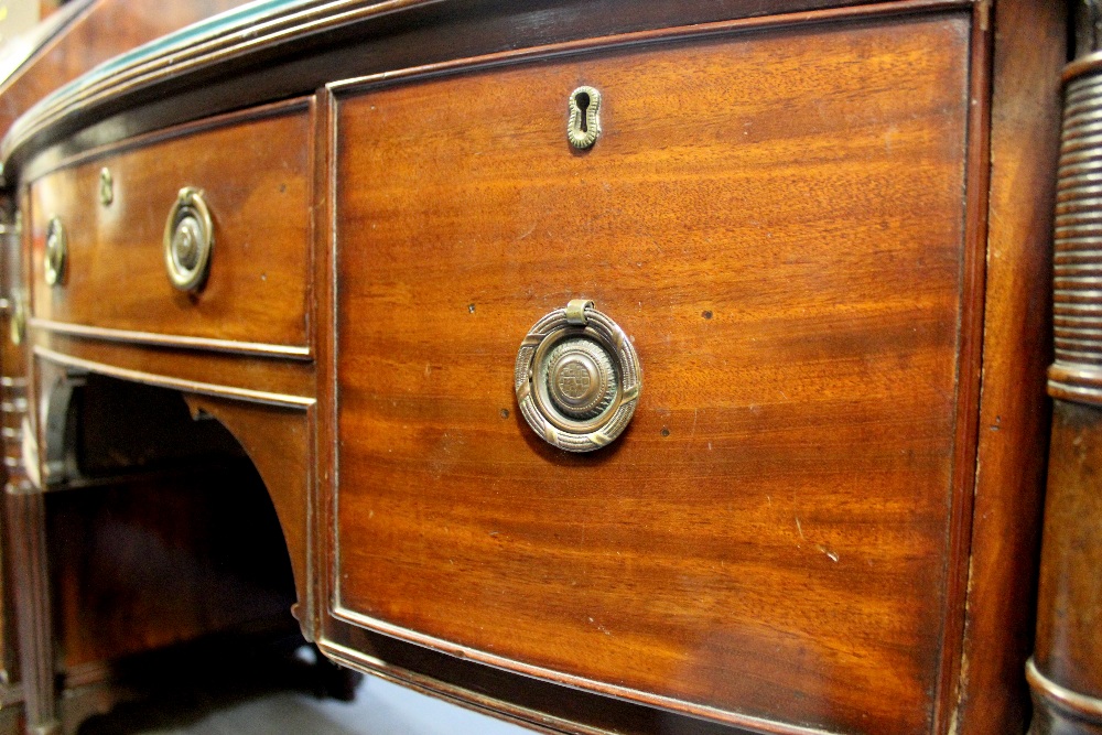 A 19th century mahogany bow-front sideboard, the top shaped with corner lugs and fitted glass top, - Image 2 of 4