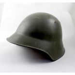 A Swiss model M18 helmet. CONDITION REPORT In average condition.