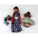 A vintage Topsy-Turvy doll and a papier-mâché doll (2).