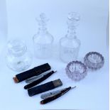 Two 19th century cut glass decanters (stoppers af), a cut glass lidded jar,