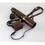 A Ross of London 1909 Tel Sig mark II, leather-cased four-drawer telescope.