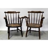 A pair of late 19th century ash and elm stick-back armchairs with rounded seats,