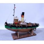 A remote control scratch-built wooden model of 'St Canute' steam tug, the deck with figures,