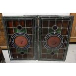 Sixteen Victorian stained and leaded glass window panels,