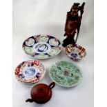 A collection of Oriental designed ceramics, plates, charger and bowl,
