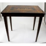 An early 20th century mahogany Italian side table with marquetry inlaid top depicting a country