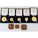 Eight Churchill commemorative medallions comprising two large silver gilt, each approx 64g,