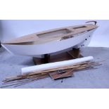 Three modern part scratch-built wooden model boats, unfinished projects, each with some materials,