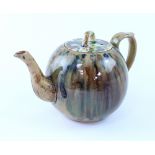 A 19th century Staffordshire Whieldon type pottery teapot,